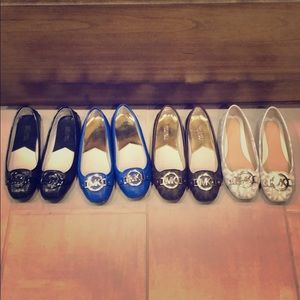 4 pairs of Michael Kors shoes